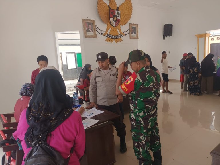 Polsek Jambon Kawal Penyaluran Bansos PKH, Pastikan Berjalan Aman dan Lancar
